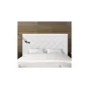 Cabecero Romo tapizado en polipiel blanco. 130 cm (alto), 145 cm (ancho), 7 cm (fondo).