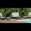 Conjunto terraza jardín aluminio Haston-8 con estructura en antracita.